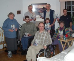 Friends holding up copies of my autobiography I’ll Do It Myself