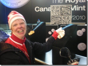 Glenda touching a 2010 Olympic silver medal